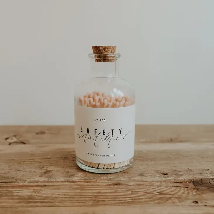 Safety matches in apothecary jar, rouge