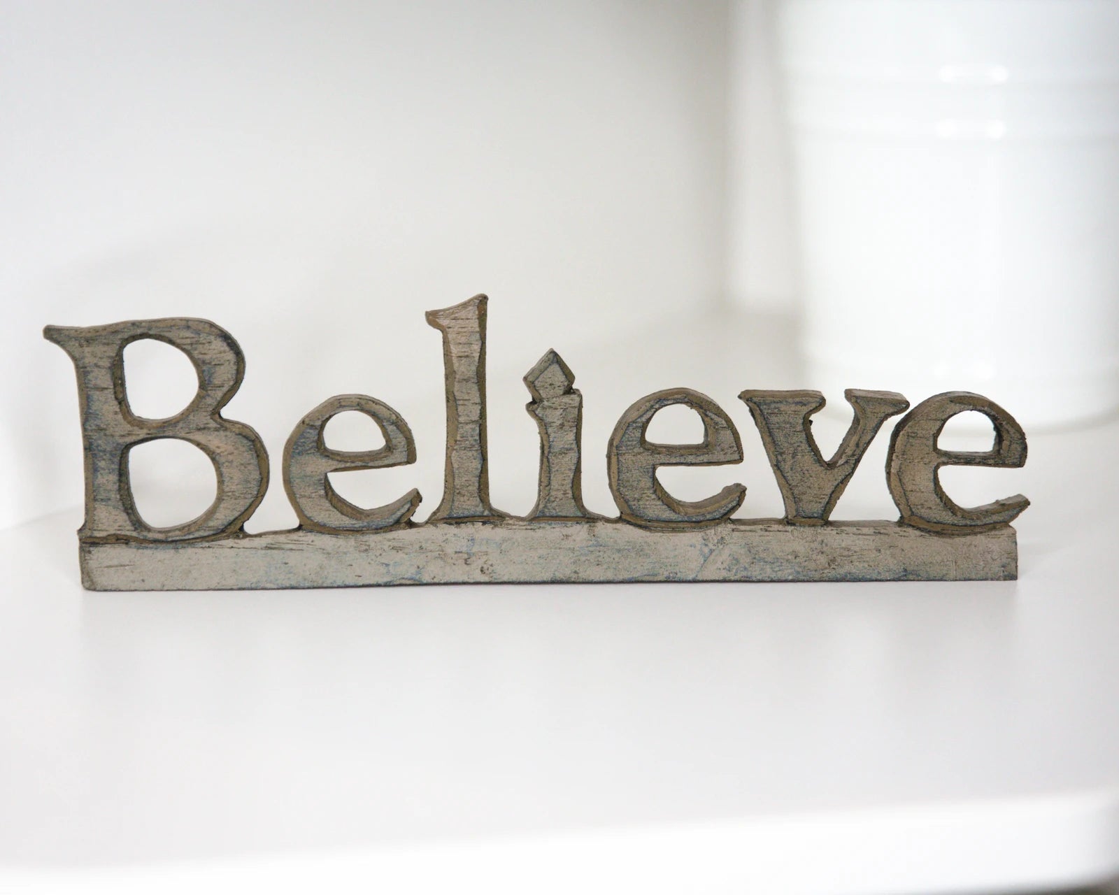 Schriftzug"Believe"