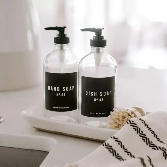 "Hand Soap" soap dispenser made of clear glass, black label