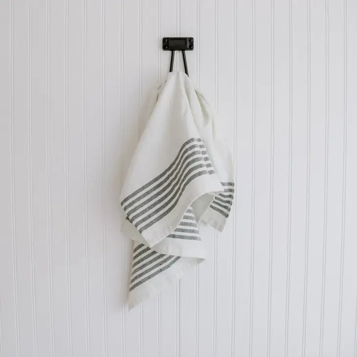 Cream striped tea towel with 5 black stripes