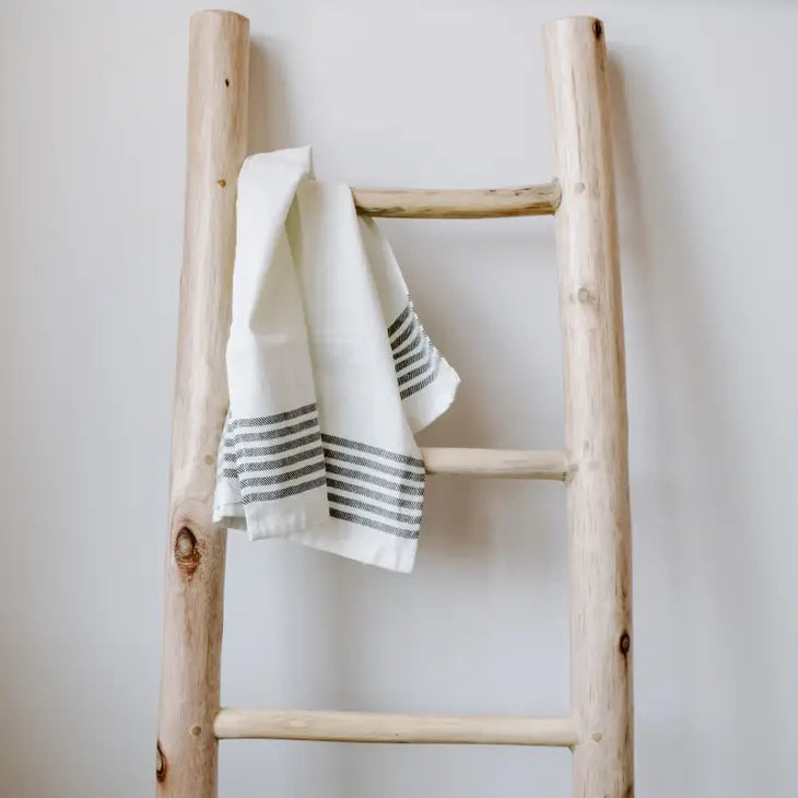 Cream striped tea towel with 5 black stripes